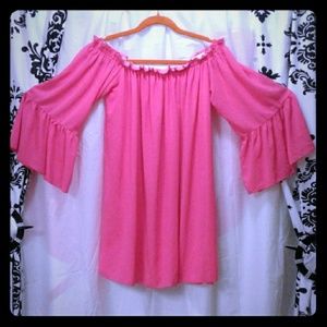Pinkish coral colored off the shoulder dress